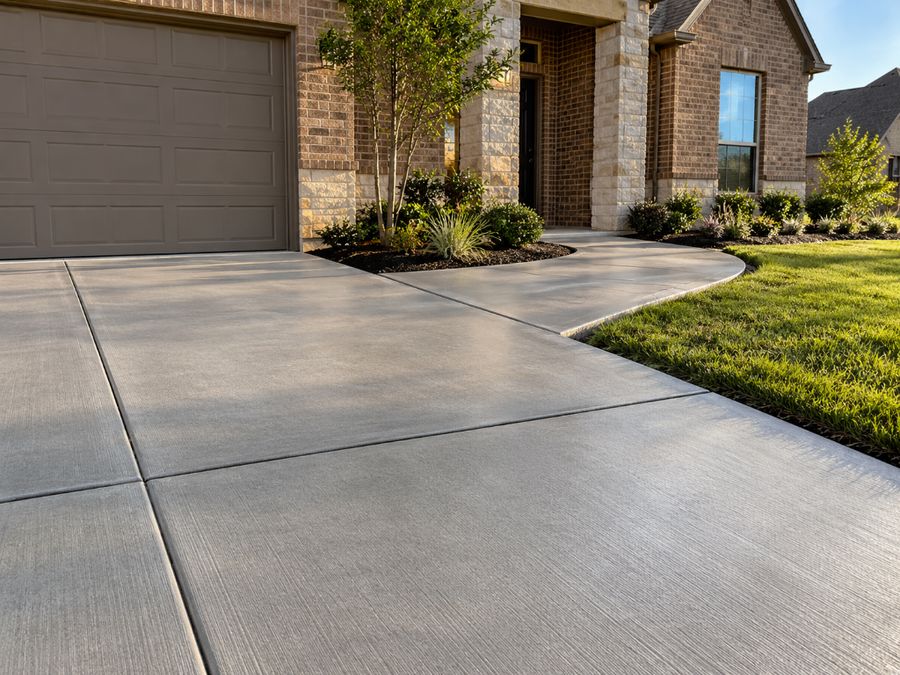 Finished concrete driveway and walkway (illustrative image)