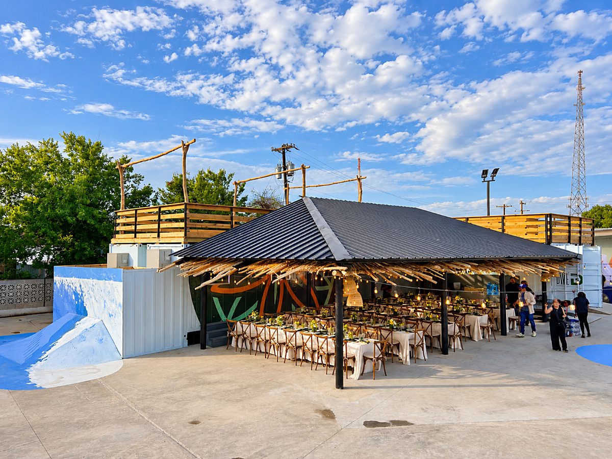 Covered dining pavilion and wave-mural ramp built by the Texas 1st Services crew at the 4DWN skate park