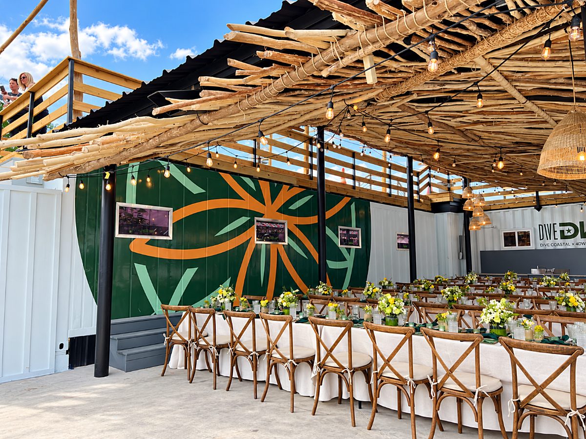 Event pavilion with banquet tables and string lights