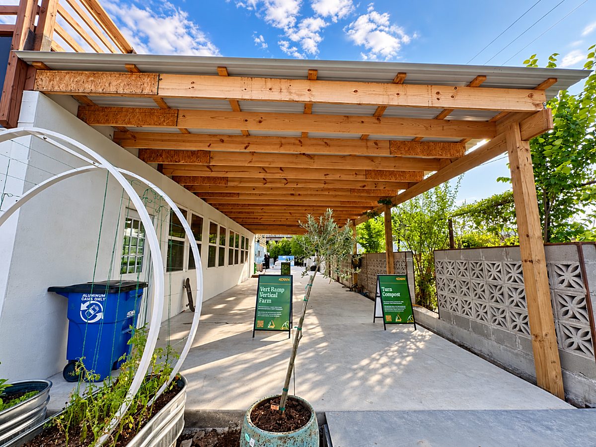 Open horizontal wood gate revealing the backyard, built by Texas 1st Services